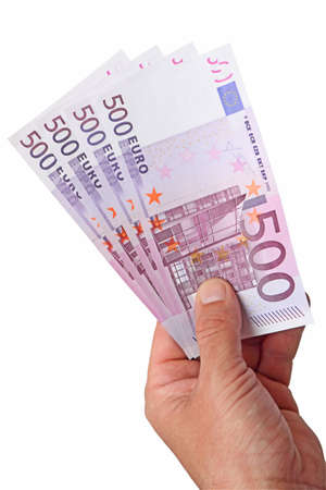 Money 500 Euro banknotes in her hand. The image is isolated on a white background.の写真素材