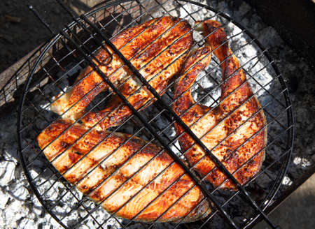 Fried fish on the grill. Top viewの写真素材