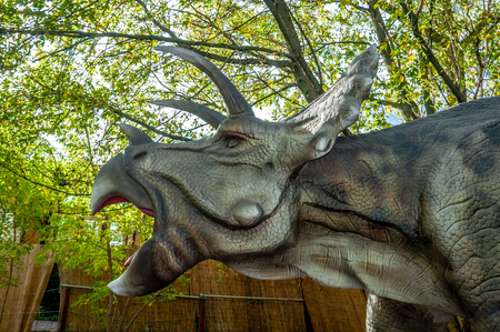 Triceratops dinosaur head with open mouth closeup. Profile viewのeditorial素材