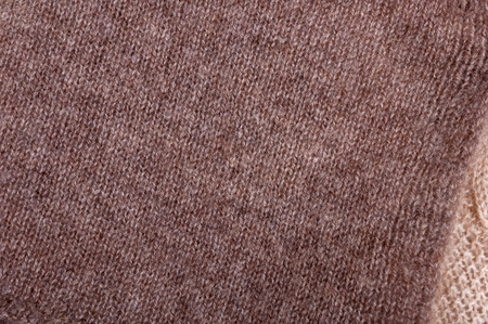 Texture of brown and beige knitted wool. Small knitting. Top view close upの写真素材
