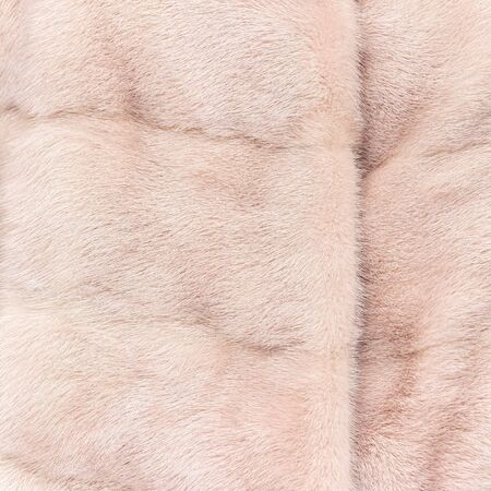Texture of natural pink shiny fur with a beautiful pattern