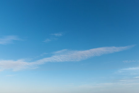 Picturesque blue sky with large beautiful clouds on a bright sunny day. Sky replacement templateの写真素材