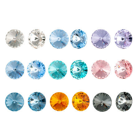 Crystal transparent multi-colored strasses and crystals of a round shape. Isolated on white backgroundの写真素材