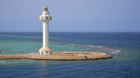 Sign forÂ ships orÂ lonely lighthouse at seaの写真素材