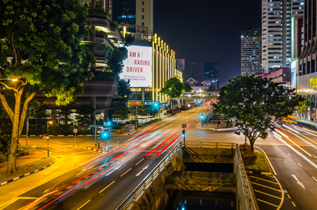 Singapore - August 20: Night streets of the Singapore business area on August 20, 2014 in Singapore.の写真素材
