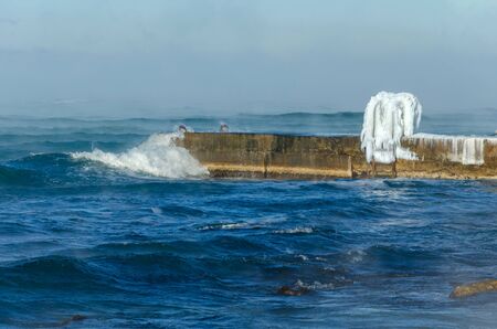 Wave of the black sea in winterの写真素材