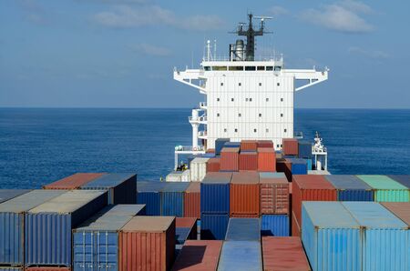 Container vessel in the middle of the oceanの写真素材