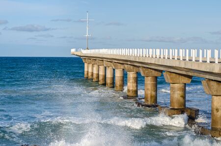 Pier against the background of the sea surfの写真素材