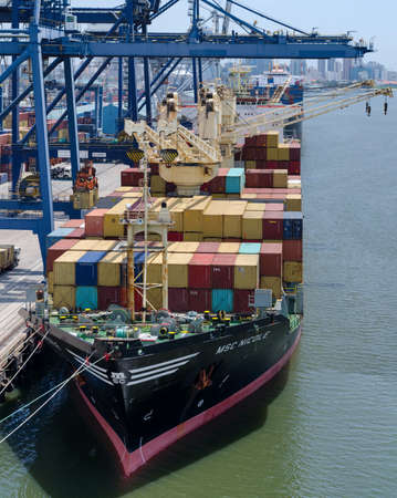 Dar es Salaam, Tanzania - March 29: Container vessel in port of Dar es Salaam on March 29, 2018 in Dar es Salaam, Tanzania.のeditorial素材
