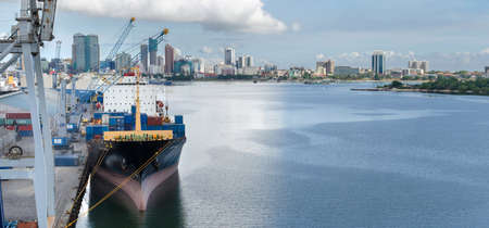 Dar es Salaam, Tanzania - February 21: Container terminal and city landscape in port of Dar es Salaam on February 21, 2018 in Dar es Salaam, Tanzania.のeditorial素材