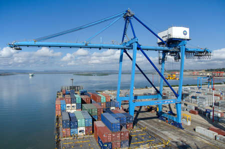 Mombasa, Kenya - February 19: Container terminal with mooring vessel in the Mombasa on February 19, 2018 in Mombasa, Kenya.のeditorial素材