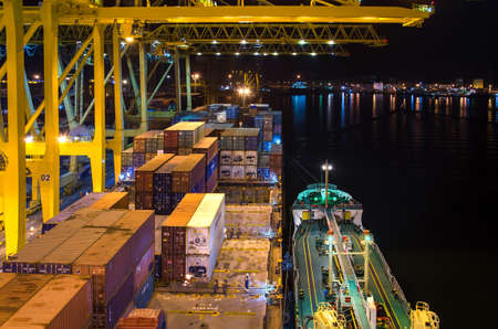 Khor Fakkan, United Arab Emirates - March 14: Container terminal in port of Khor Fakkan on March 14,...