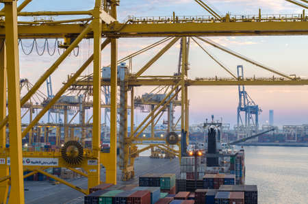 Jebel Ali, United Arab Emirates - March 16: Container terminal in port of Jebel Ali on March 16, 2018 in Jebel Ali, United Arab Emirates.のeditorial素材
