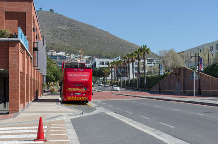 Cape Town, Republic of South Africa - April 11: Main road with city tour bus station on April 11, 2018 in Cape Town, Republic of South Africa.のeditorial素材