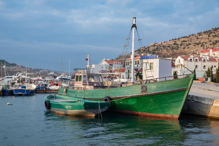 Balaklava, Crimea - February 12: The Boat near the pier on February 12, 2022 in Balaklava, Crimea.のeditorial素材
