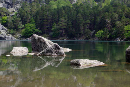 Black lagoon, a place of peace and quiet in the Soria mountainの写真素材