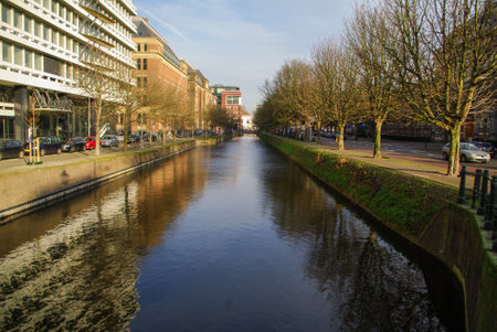 In Amsterdam, at Christmas time, we can find many different landscapes, from ice rinks to canals and buildings by the water. Bicycles and windmills are other attractions of the city. Even the flower market at Christmas is a nice place to visit. cafeteria.のeditorial素材