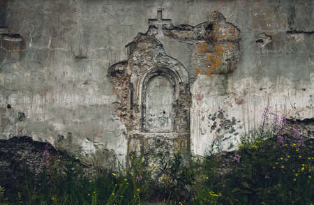 Cross on the wall. Arch. After the war. Old Fort. Destructionの写真素材
