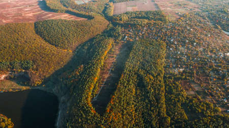 Autumn landscape. Aerial view. Autumn forest on the hillの写真素材