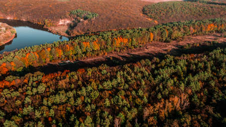Autumn landscape. Aerial view. Autumn forest on the hillの写真素材