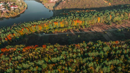 Autumn landscape. Aerial view. Autumn forest on the hillの写真素材