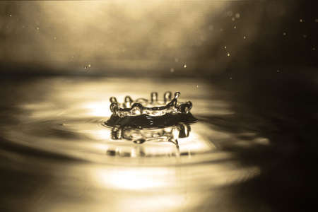 drops of pure water on blue background