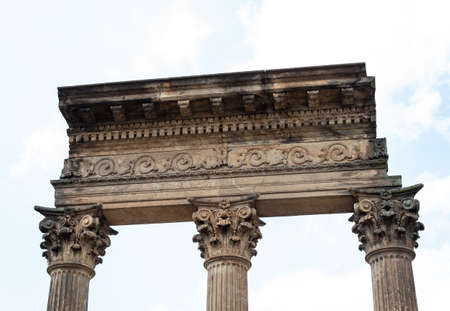 Closed Up to a Three ancient pillars into a Cementeryの写真素材