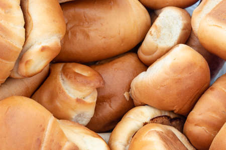 Closeup to a top view of artisan fresh bread. meals, eating and breakfast concept photographyの写真素材