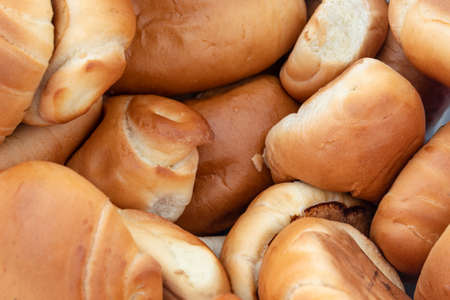 Closeup to a top view of artisan fresh bread. meals, eating and breakfast concept photographyの写真素材