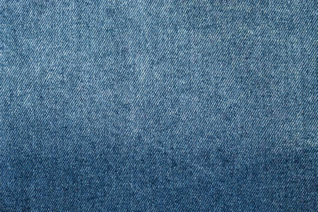 closeup to a gradient Blue jean texture. Fashion conceptの写真素材