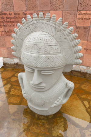 GUATAVITA, COLOMBIA - High angle view of Guatavita native chief monument into waterfont in sunny day with water reflectionのeditorial素材