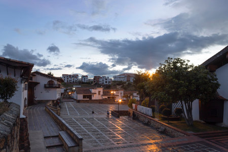 GUATAVITA, COLOMBIA - Guatavita downtown square at evening blue hourのeditorial素材