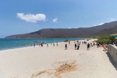 Tayrona National Park BahÃ­a concha site with tourist at sunny day.のeditorial素材