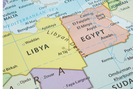 Close up to an At Taj city with a white pin needle into Libya country political mapの写真素材