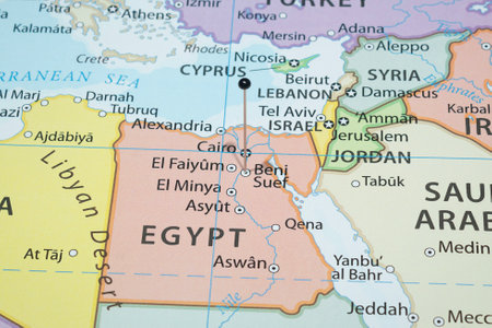 Close up to a Beni Suef city with a black pin needle into Egypt country political mapの写真素材