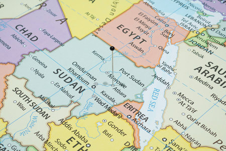 Close up to a Atbara city with a black pin needle into Sudan country political mapの写真素材