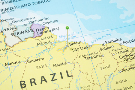 Close up to a Belem city with a green pin needle into Brazil country political mapの写真素材
