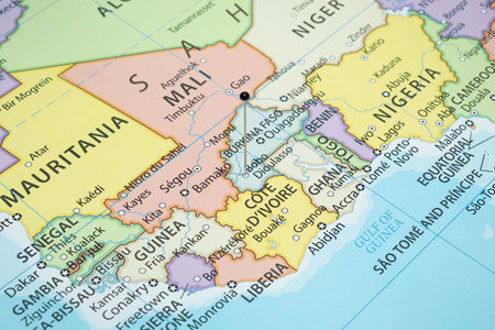 Close up to a Bobo Dioulasso city with a black pin needle into Burkina Faso country political map