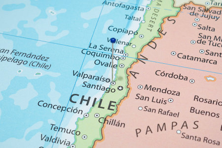 Close up to a Valparaiso city with a blue pin needle into Chile country political mapの写真素材