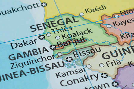Close up to a Gambia political map with country borders and most important citiesの写真素材