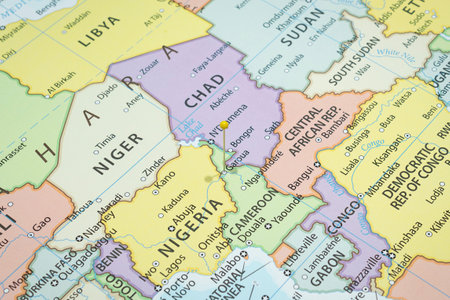 Close up to a Garoua city with a Yellow pin needle into Cameroon country political map