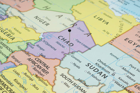 Close up to a Geneina city with a black pin needle into Sudan country political map