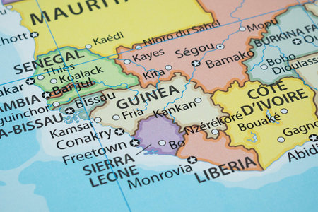 Close up to a Guinea political map with country borders and most important citiesの写真素材