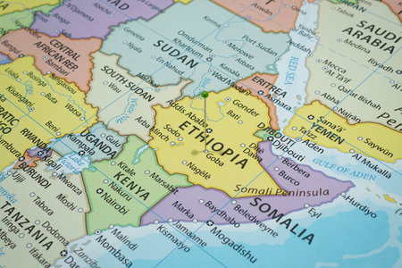 Close up to a Goba city with a green pin needle into Ethiopia country political mapの写真素材
