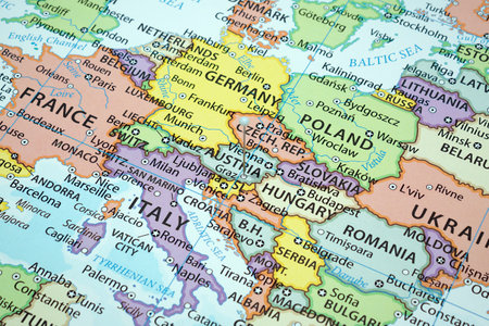 Close up to a Graz city with a white pin needle into Austria country political mapの写真素材