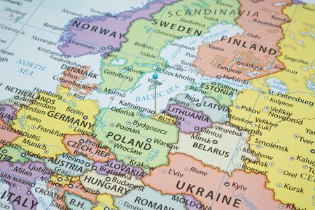 Close up to a Kaliningrad city with a light blue pin needle into russia country political mapの写真素材