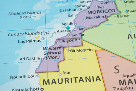 Close up to a Bir Moghrein city with a light blue pin needle into Mauritania country political mapの写真素材