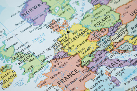 Close up to a Bonn city with a black pin needle into Germany country political mapの写真素材