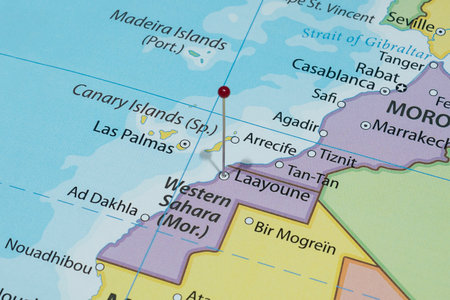 Close up to a Laayoune city with a red pin needle into Western Sahara country political map