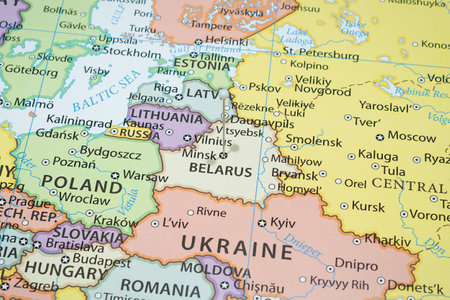 Close up to a Minsk city with a white pin needle into Belarus country political map